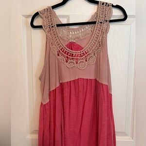 Cute oversized tank with intricate neckline design